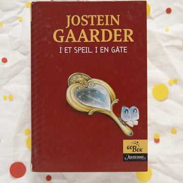 I et speil, i en gåte